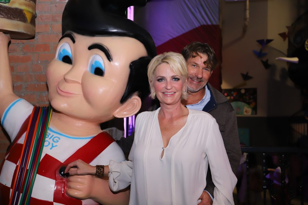 Adult Party couple with Big Boy Sculpture at private birthday event